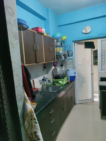 Kitchen in 2 BHK Apartment at Charms Castle, Raj Nagar Extension – for Sale