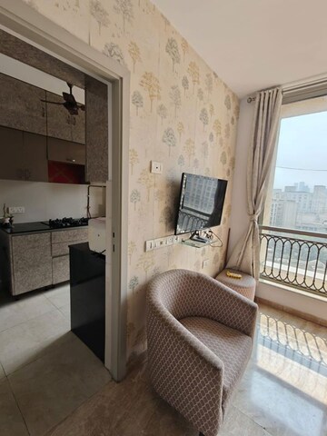 Living Room in 1 BHK Apartment at Hiranandani Lavinia, Ghodbunder Road – for Rent