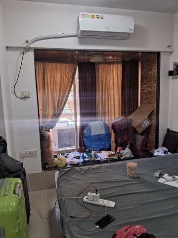 Living Room in 2 BHK Apartment at Rustomjee OZone, Goregaon West – for Rent