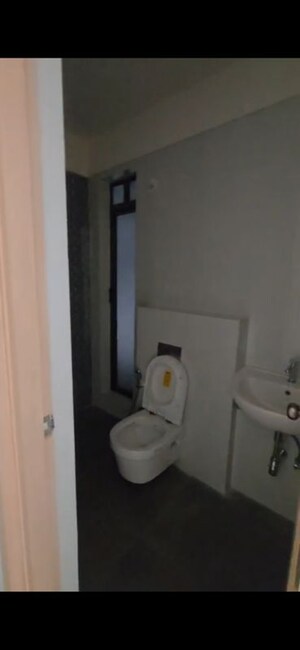 Bathroom in 2 BHK Apartment at Rajesh Raj Infinia, Malad West – for Rent
