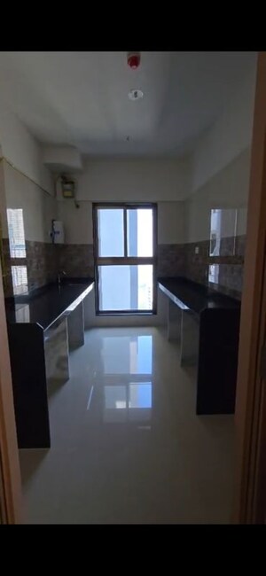Kitchen in 2 BHK Apartment at Rajesh Raj Infinia, Malad West – for Rent