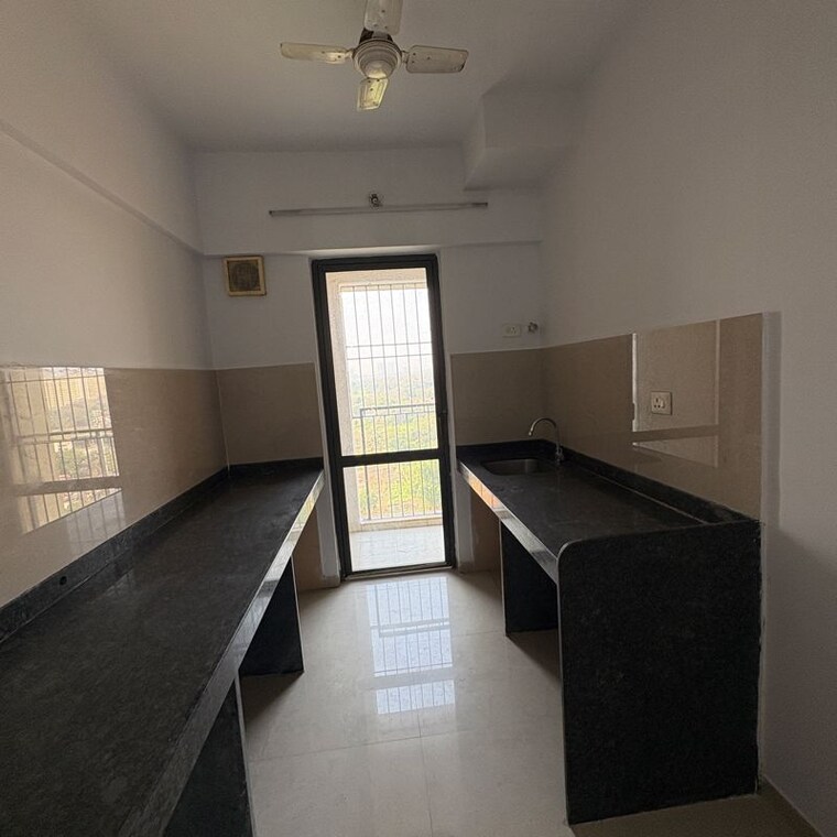Kitchen, lodha-palava-city-lakeshore-greens 1 Bedroom 508 Sq.Ft. Apartment In Hedutane Thane 10036480