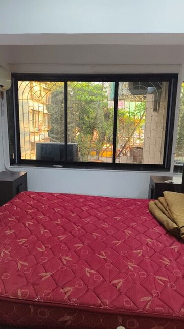 Bedroom in 2 BHK Apartment at Karachi Citizens CHS, Juhu – for Rent