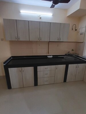 Kitchen in 2 BHK Apartment at Lokhandwala Whispering Palms, Lokhandwala – for Sale