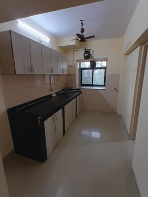 Kitchen in 2 BHK Apartment at Lokhandwala Whispering Palms, Lokhandwala – for Sale