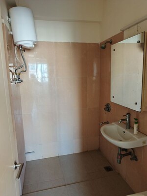 Bathroom in 3 BHK Apartment at Smart World Orchard, Sector 61 – for Sale