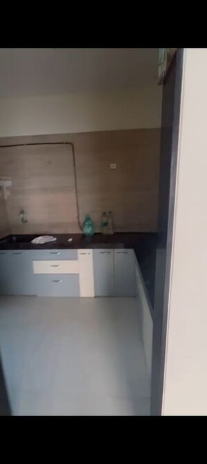 Kitchen in 2 BHK Apartment at Tricity Promenade, Seawoods – for Rent