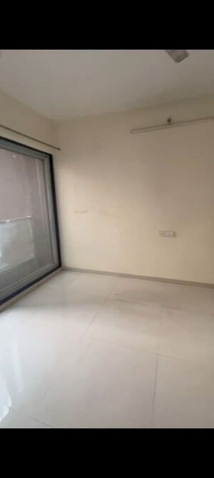 Room in 2 BHK Apartment at Tricity Promenade, Seawoods – for Rent