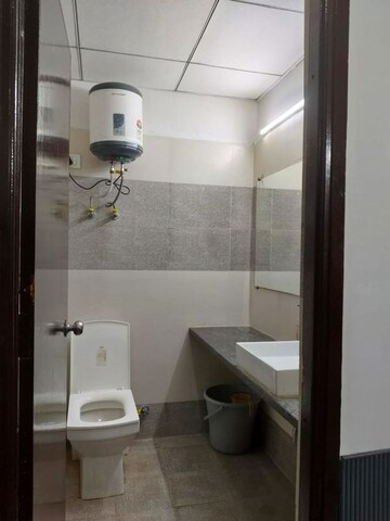 Bathroom in 1 BHK Apartment at Paramount Golfforeste, Zeta I Greater Noida – for Rent