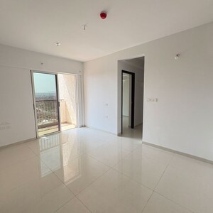 Living Room in 2 BHK Apartment at Lodha Codename Premier, Mangaon – for Sale