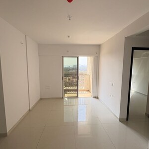 Living Room in 2 BHK Apartment at Lodha Codename Premier, Mangaon – for Sale