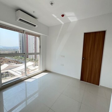 Master Bedroom in 2 BHK Apartment at Lodha Codename Premier, Mangaon – for Sale