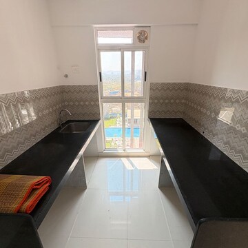 Kitchen in 2 BHK Apartment at Lodha Codename Premier, Mangaon – for Sale