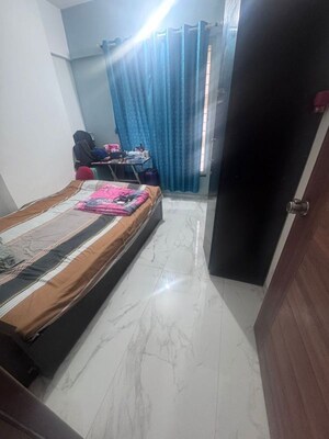 Bedroom in 2 BHK Apartment at Kishor Platinum Towers, Wakad – for Rent