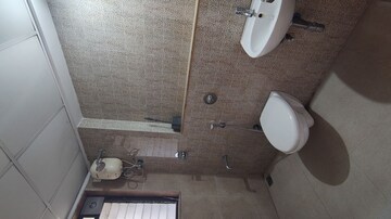 Bathroom in 1.5 BHK Apartment at Lodha Palava City Lakeshore Greens, Dombivli East – for Rent
