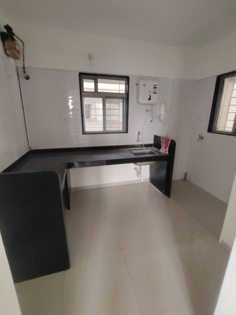 Kitchen, amit-s-astonia-classic 2 Bedroom 1000 Sq.Ft. Apartment In Undri Pune 10036778