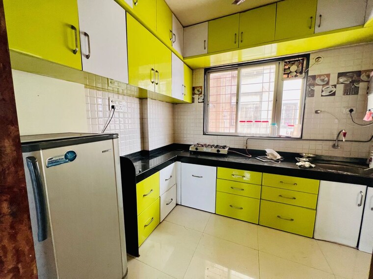Kitchen, vardhaman-heights 2 Bedroom 963 Sq.Ft. Apartment In Rahatani Pune 10036854