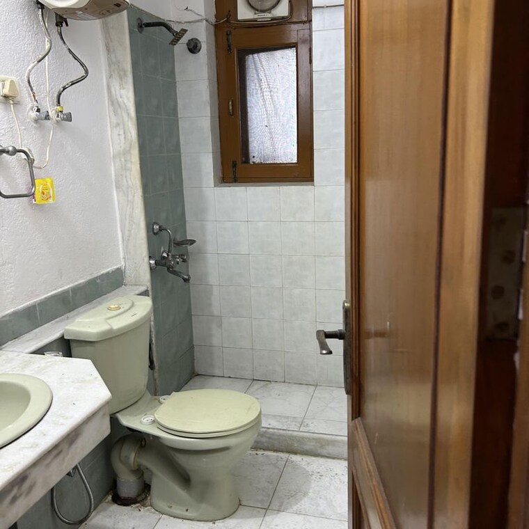 Bathroom, ats-green-village 3 Bedroom 1300 Sq.Ft. Apartment In Sector 93a Noida 10037358