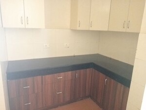 Kitchen in 3.5 BHK Apartment at Orchid Petals, Sector 49 – for Rent