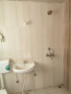 Bathroom in 2 BHK Apartment at Pivotal Riddhi Siddhi, Sector 99 – for Rent