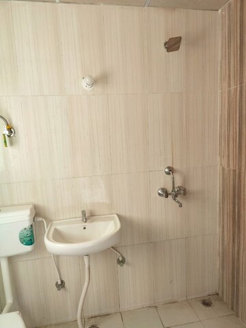 Bathroom in 2 BHK Apartment at Pivotal Riddhi Siddhi, Sector 99 – for Rent