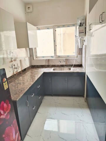 Kitchen in 2 BHK Apartment at Pivotal Riddhi Siddhi, Sector 99 – for Rent