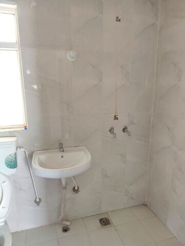 Bathroom in 2 BHK Apartment at Pivotal Riddhi Siddhi, Sector 99 – for Rent