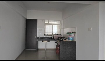 Kitchen in 3 BHK Apartment at Mantra Parkview, Dhayari – for Sale