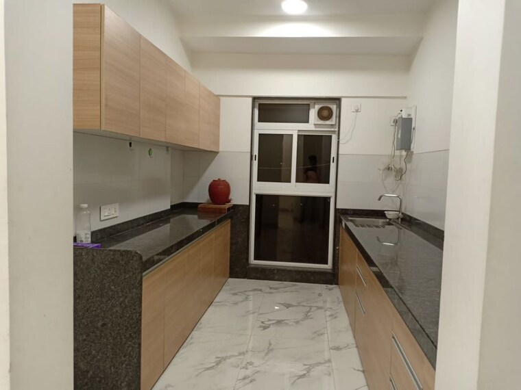 Kitchen, raheja-ridgewood 3 Bedroom 1075 Sq.Ft. Apartment In Goregaon East Mumbai 10039250