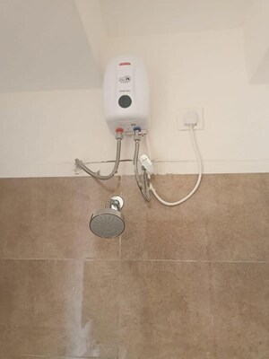 Bathroom in 2 BHK Apartment at Omkar Signet, Malad East – for Rent