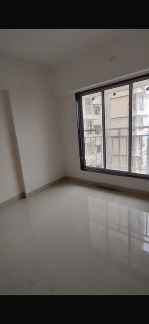 Room in 2 BHK Apartment at Omkar Signet, Malad East – for Rent