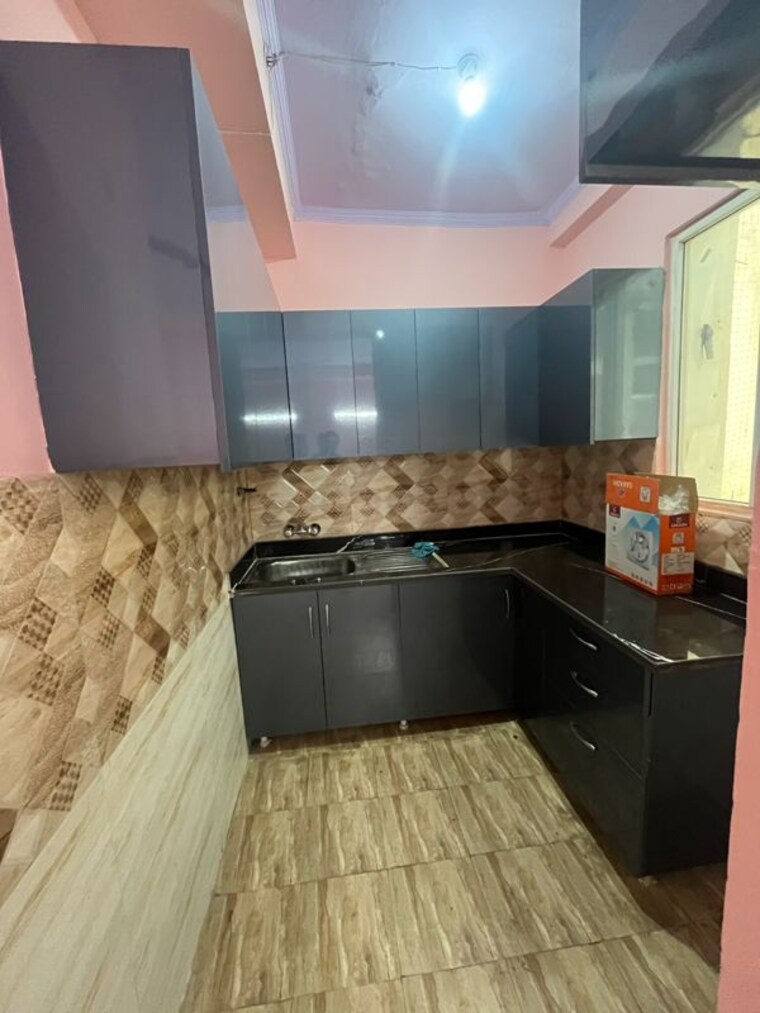 Kitchen, amrapali-golf-homes 2 Bedroom 835 Sq.Ft. Apartment In Haibatpur Greater Noida 10039316