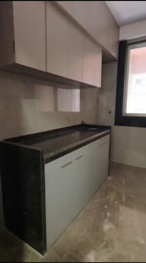 Kitchen in 3 BHK Apartment at Laxmi Raajvilas Malad, Malad West – for Rent