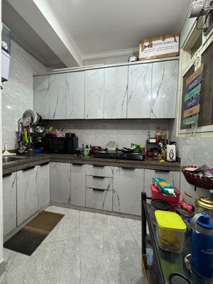 Kitchen in 2 BHK Builder Floor at Palm Residency Chhatarpur, Rajpur Khurd Extension – for Rent