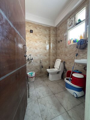 Bathroom in 2 BHK Builder Floor at Palm Residency Chhatarpur, Rajpur Khurd Extension – for Rent