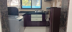 Kitchen in 2 BHK Apartment at DGS Sheetal Dharmaraj, Malad West – for Rent