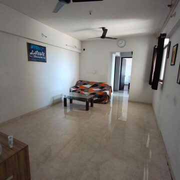 Living Room in 1 BHK Apartment at Lodha Palava City Lakeshore Greens, Hedutane – for Rent