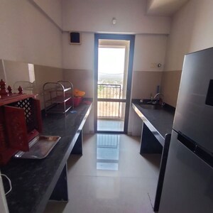 Living Room in 1 BHK Apartment at Lodha Palava City Lakeshore Greens, Hedutane – for Rent