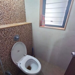 Bathroom in 1 BHK Apartment at Lodha Palava City Lakeshore Greens, Hedutane – for Rent