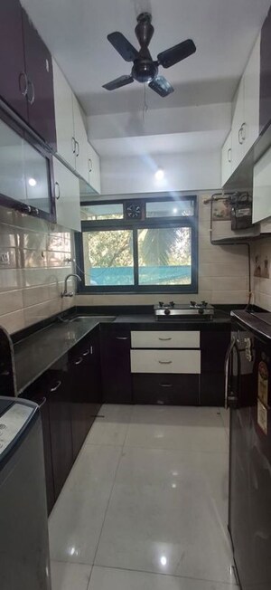 Kitchen in 2 BHK Apartment at DGS Sheetal Dharmaraj, Malad West – for Rent