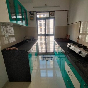 Kitchen in 1 BHK Apartment at Lodha Palava Downtown, Taloja Bypass Road – for Sale