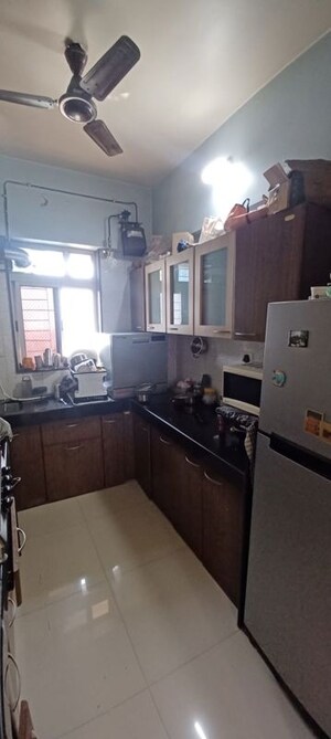 Kitchen in 2 BHK Apartment at Vraj Green Valley, Kolshet Industrial Area – for Rent
