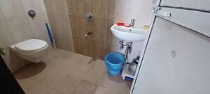 Bathroom in 2 BHK Apartment at Vraj Green Valley, Kolshet Industrial Area – for Rent
