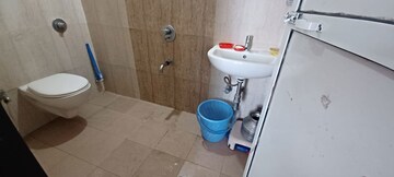 Bathroom in 2 BHK Apartment at Vraj Green Valley, Kolshet Industrial Area – for Rent
