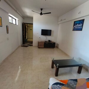 Living Room in 1 BHK Apartment at Lodha Lakeshore Greens, Hedutane – for Sale