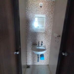 Bathroom in 1 BHK Apartment at Lodha Lakeshore Greens, Hedutane – for Sale