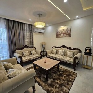 Living Room in 3 BHK Apartment at Maya Green Lotus Utsav, International Airport Road – for Rent
