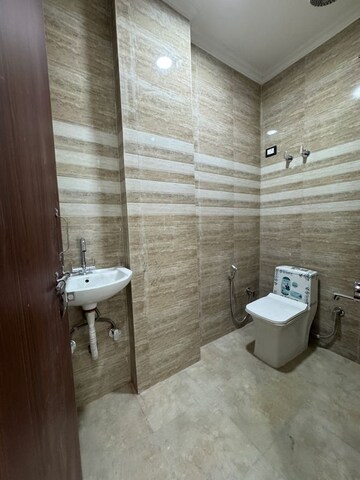 Bathroom in 1 BHK Builder Floor at Palm Residency Chhatarpur, Rajpur Khurd Extension – for Rent