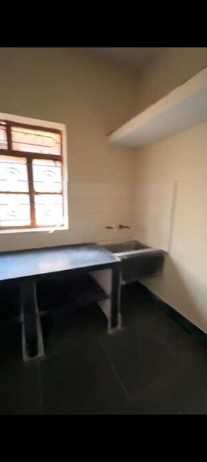 Kitchen in 1 BHK Apartment at Pimple Gurav – for Rent