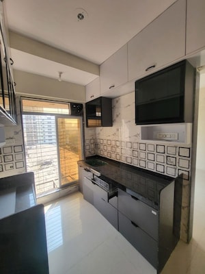 Kitchen in 1 BHK Apartment at Re Form Delta House, Goregaon East – for Rent